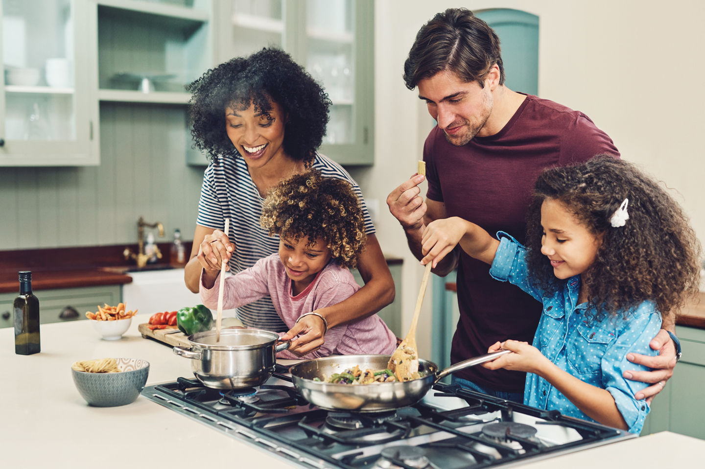 Children cooking with parents