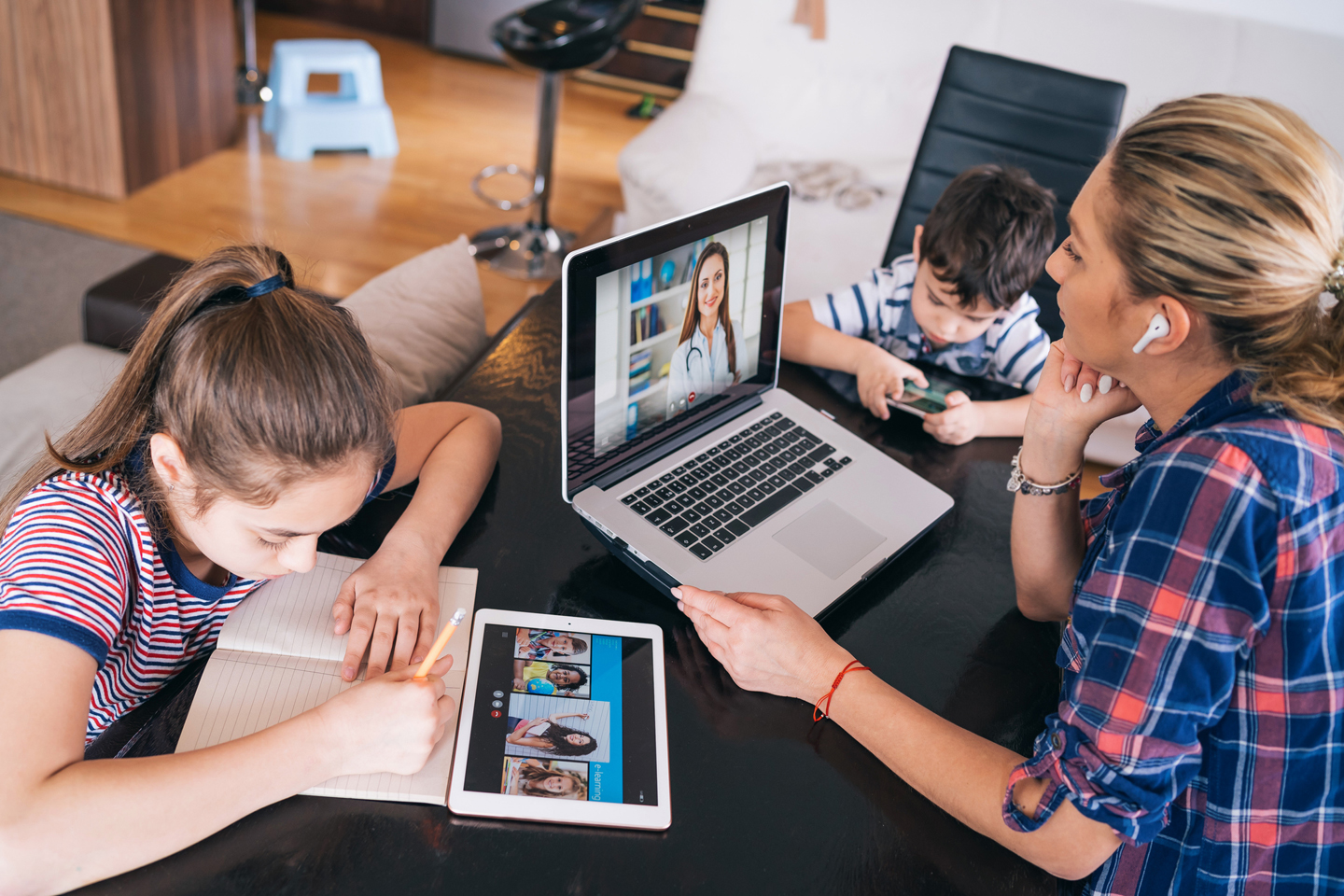 Parent and child working and learning virtually