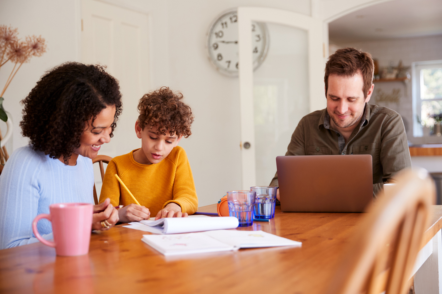 Elementary school parents helping child with homework