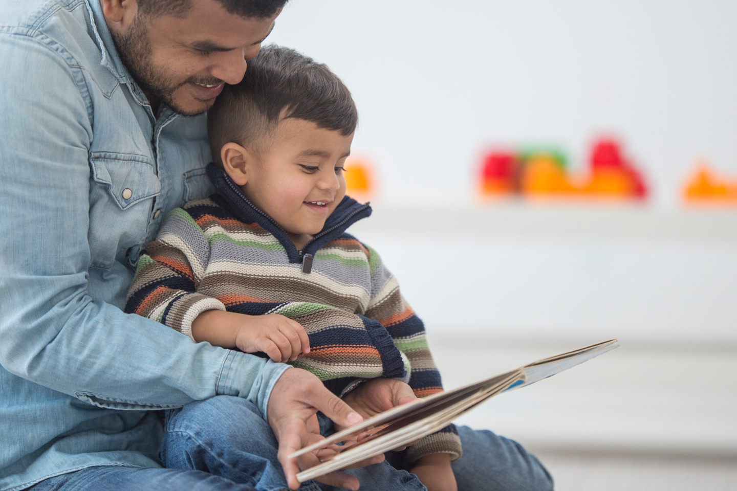 Parent and child reading book