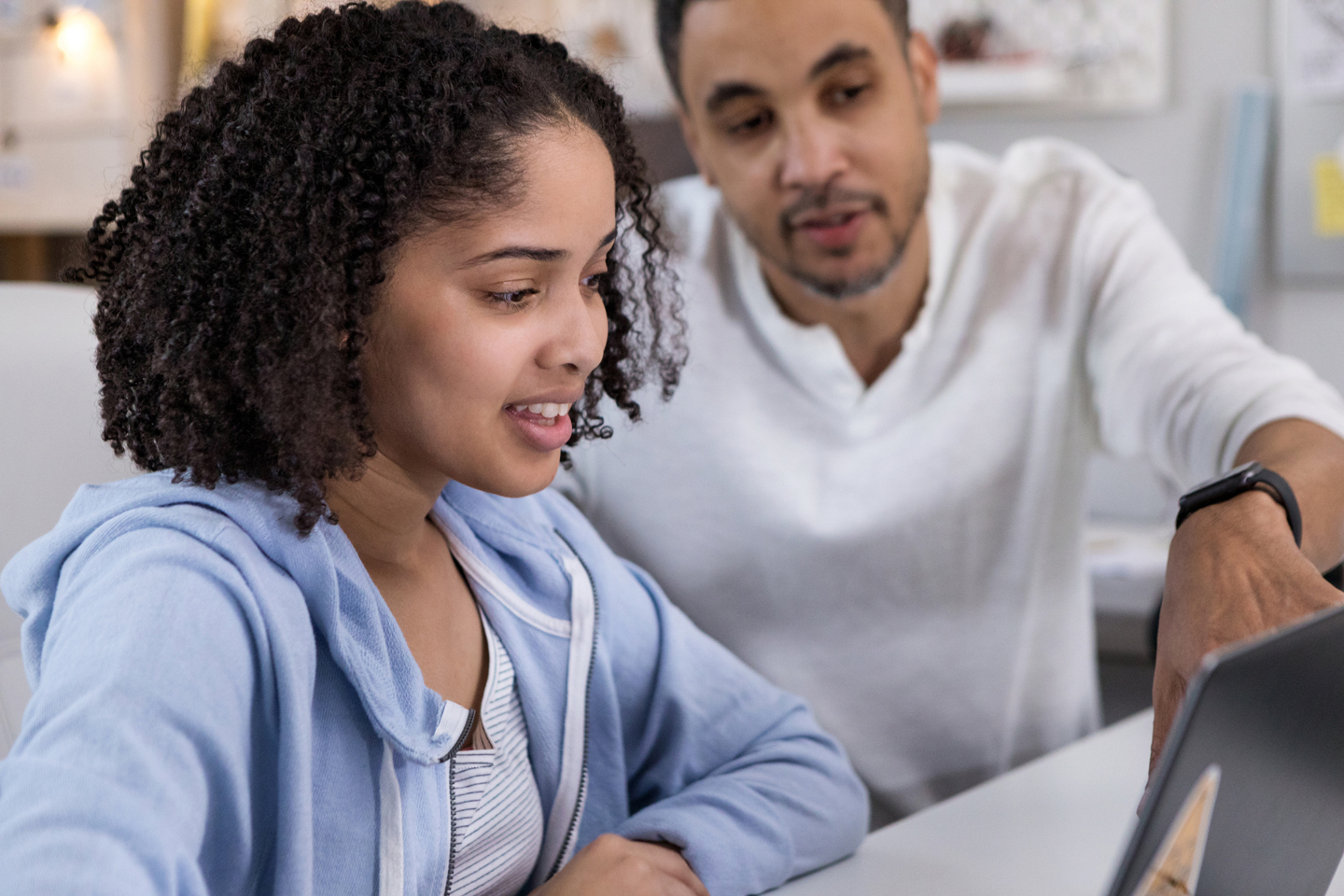 Student and parent on laptop