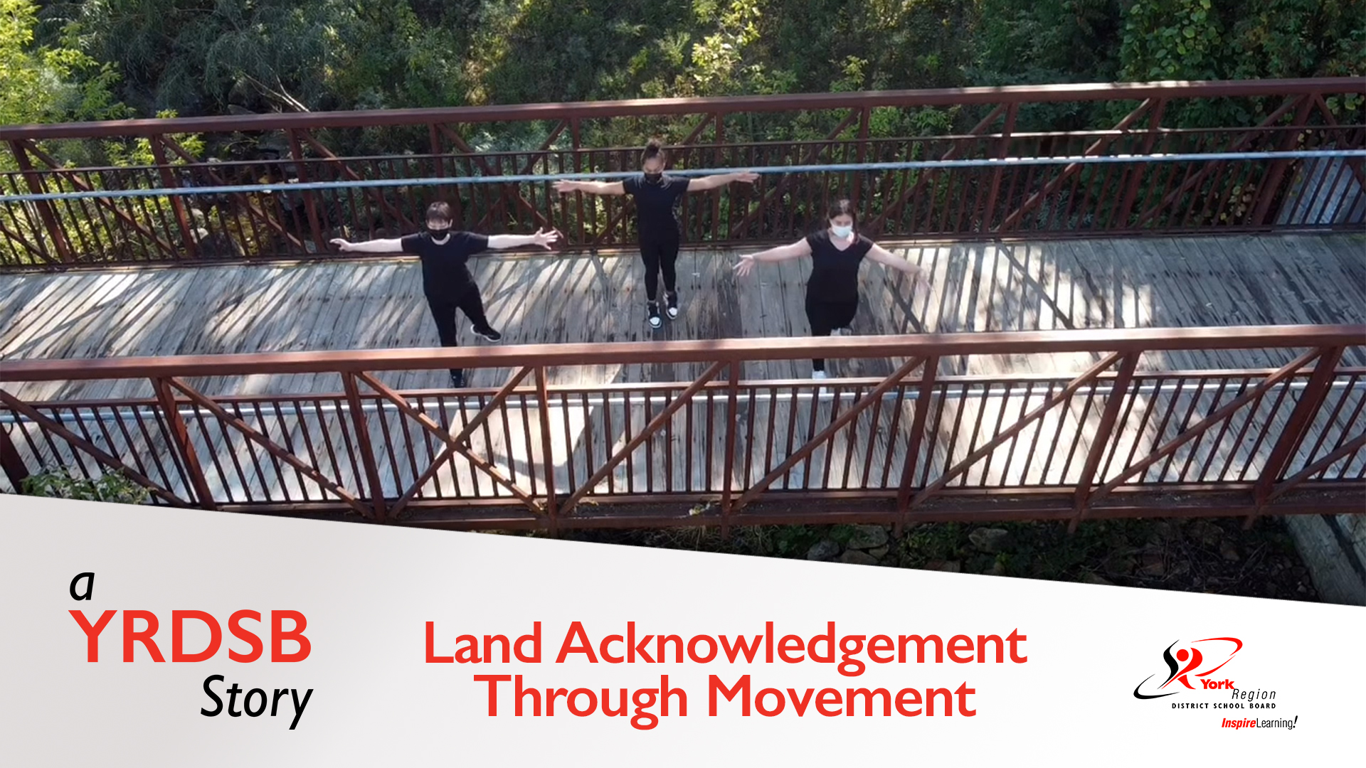 Students dancing on a bridge