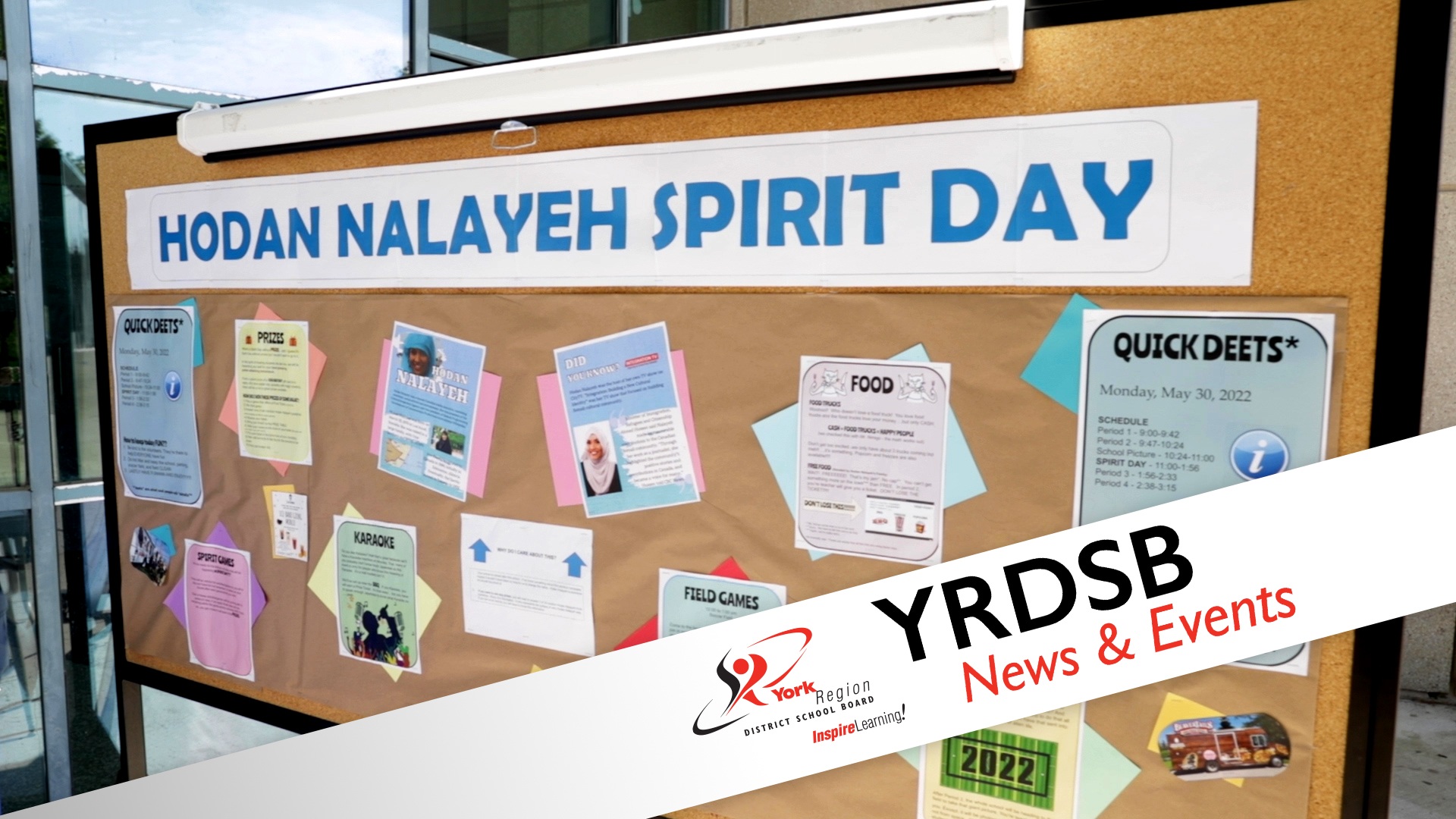 Bulletin board that reads Hodan Nalayeh Sprit Day with papers posted on it