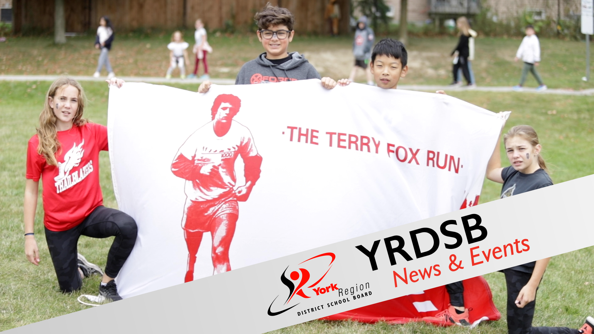 Students holding Terry Fox Run banner
