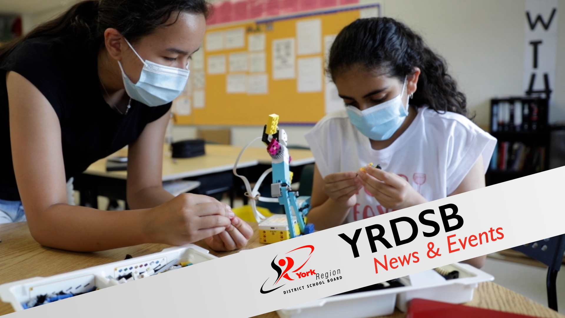 Two students work on STEM project