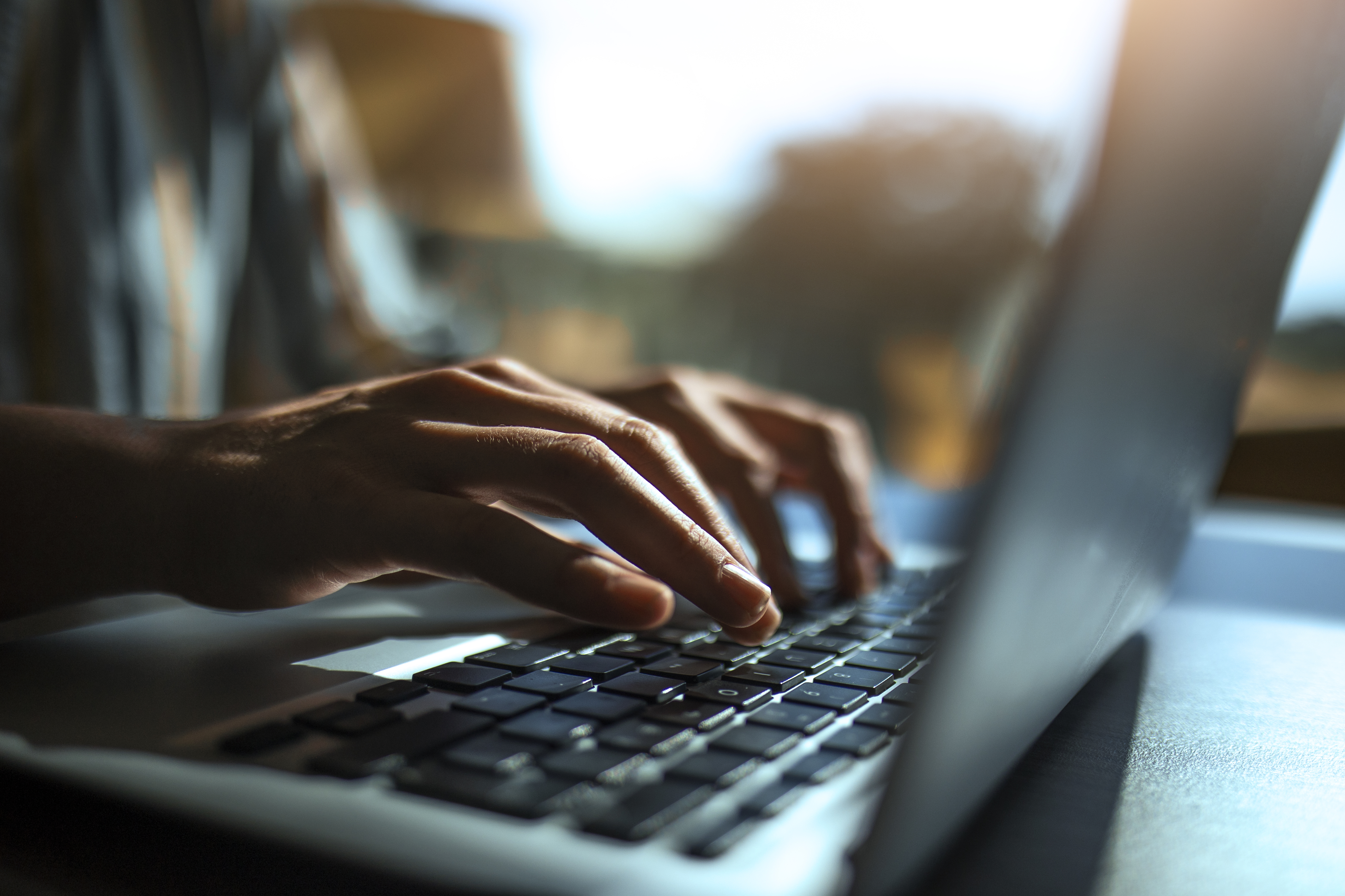 hands-using-laptop
