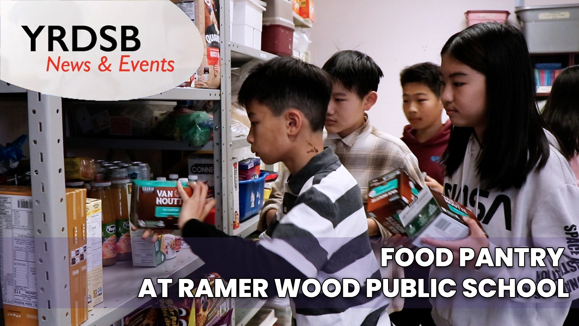 Group of students stand by shelves of food sorting it