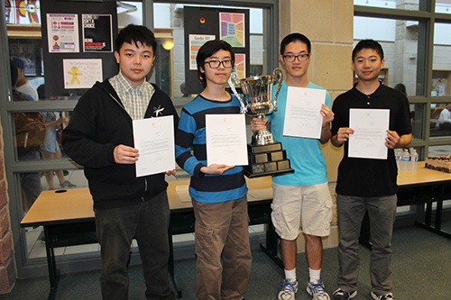 Four students who competed in the ECOO
