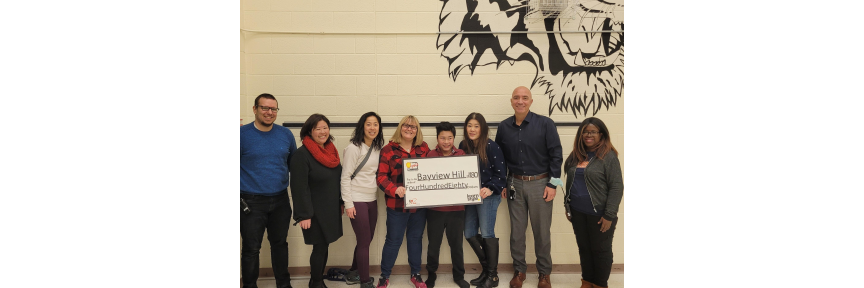 Learnstyle representative, staff and student at Bayview Hill ES pose with large grant cheque.