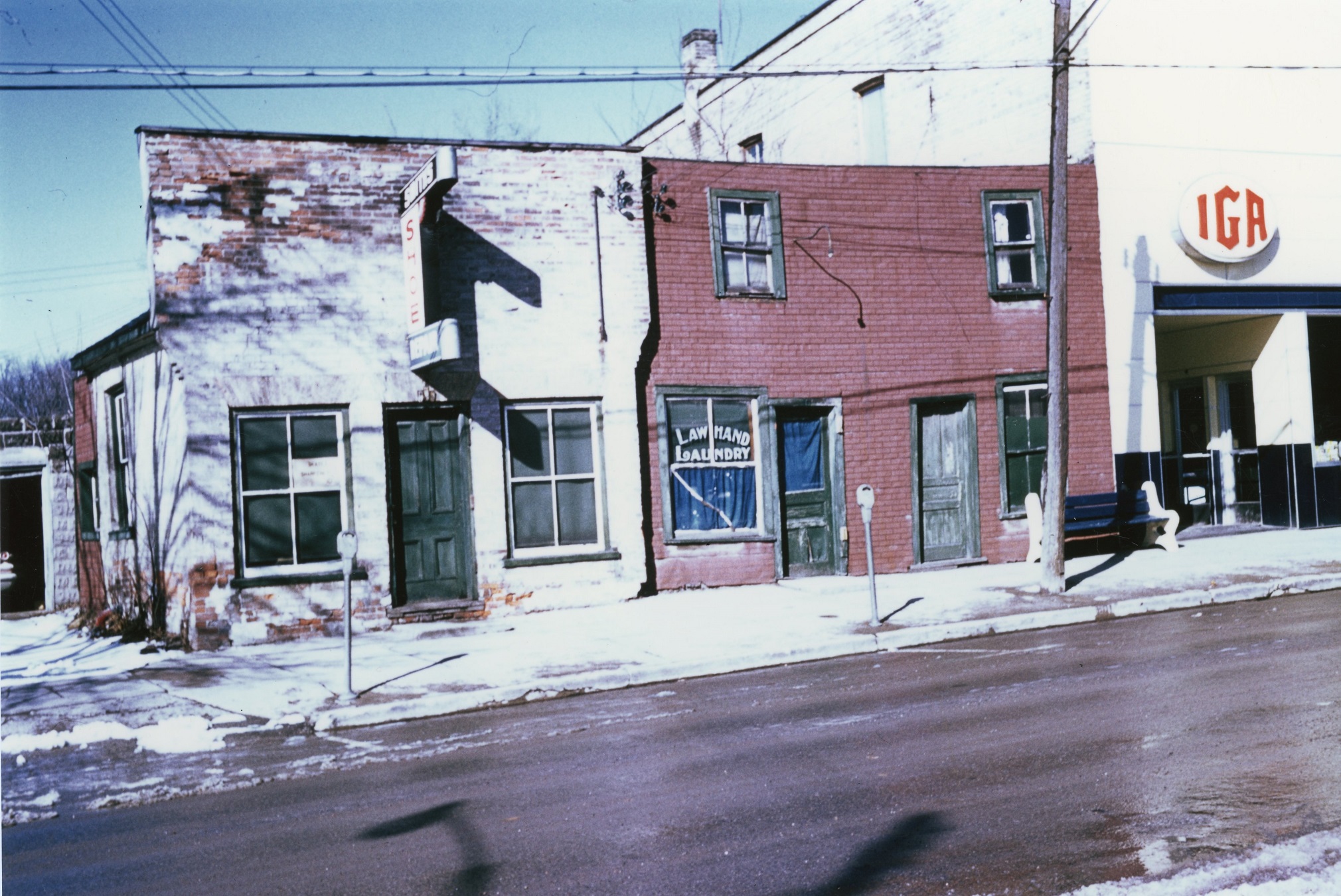 The red brick building in this photograph is Law Sum’s Laundry.