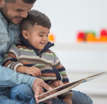 Parent and child reading book