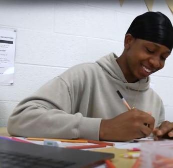 black student writing