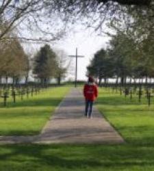 Student walking down path at Neuville-St.-Vaast
