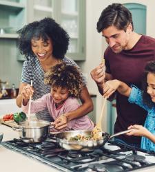 Children cooking with parents