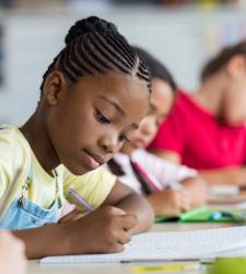 Students writing in class