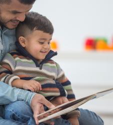 Parent and child reading book