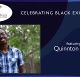 Quinton Hyde standing in front of trees smiling