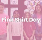 Four students in pink shirts