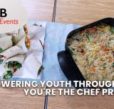 wraps and a noodle dish sit on a table