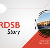 Grey and red background with a circular cut-out photo of the Sharon PS building. Words read a YRDSB story: the community of Sharon P.S. 