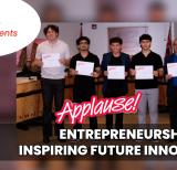 Students stand smiling holding certificates in boardroom.  Text reads "YRDSB news and events: Applause: Entrepreneurship club: Inspiring future innovators