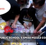 family sits a table doing a jigsaw puzzle together