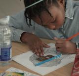 student colours at a table