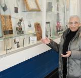 Bernice Carnegie stands in front of display about her father